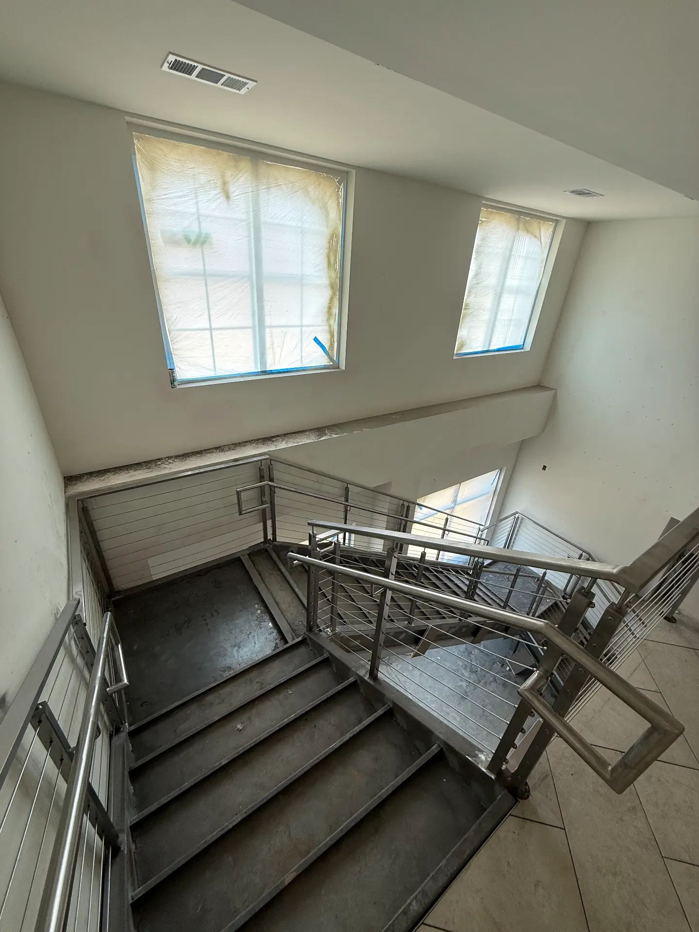 Interior steel stair landing under construction